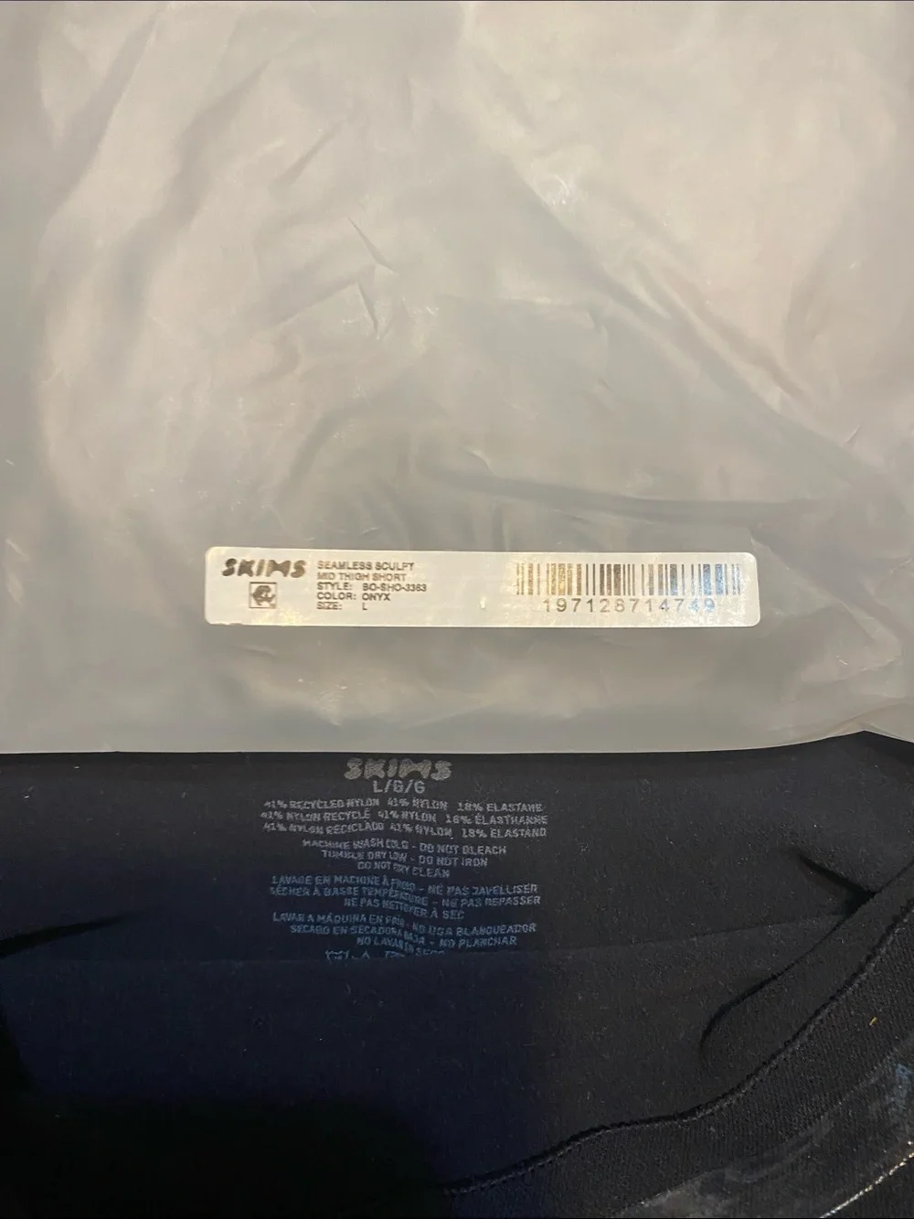 SKIMS Black mid thigh shorts size large